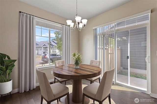329 Holland Ave, Bellingham, WA 98226 - dining area featuring a chandelier and dark wood finished floors