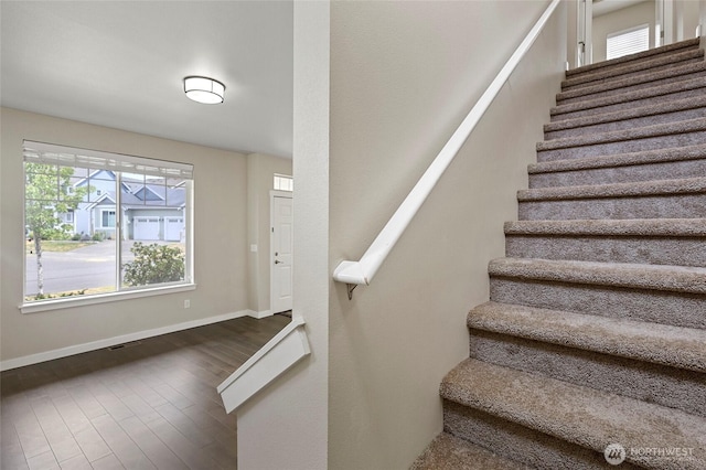 329 Holland Ave, Bellingham, WA 98226 - staircase with wood finished floors and baseboards