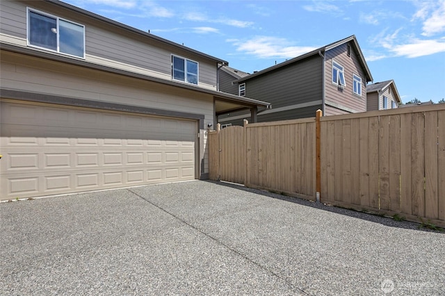 329 Holland Ave, Bellingham, WA 98226 - view of side of home featuring a garage and driveway