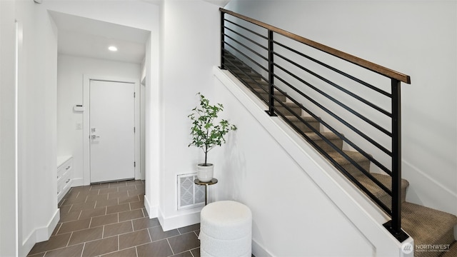 9608 NE 182nd Ct Unit D, Bothell, WA 98011 - staircase with recessed lighting and tile patterned floors