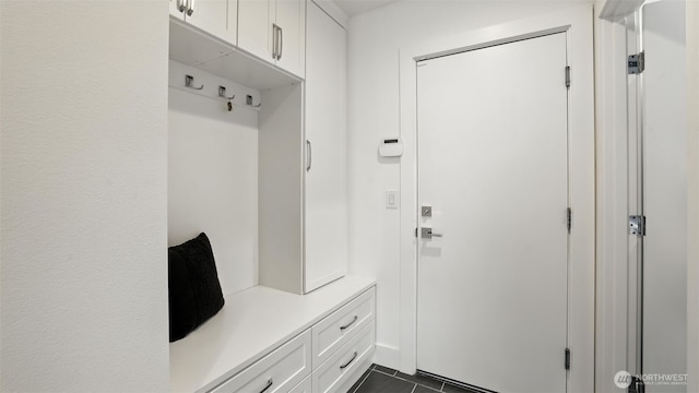 9608 NE 182nd Ct Unit D, Bothell, WA 98011 - mudroom featuring dark tile patterned floors