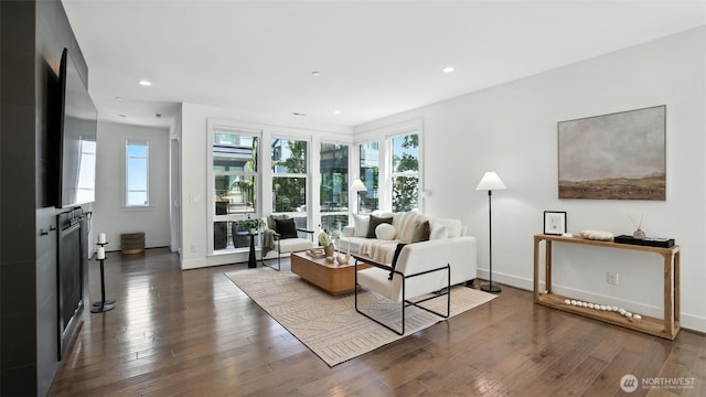 9608 NE 182nd Ct Unit D, Bothell, WA 98011 - living area with plenty of natural light, wood finished floors, and recessed lighting
