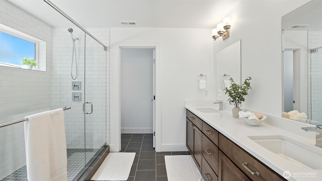 9608 NE 182nd Ct Unit D, Bothell, WA 98011 - bathroom featuring double vanity, a shower stall, and tile patterned floors