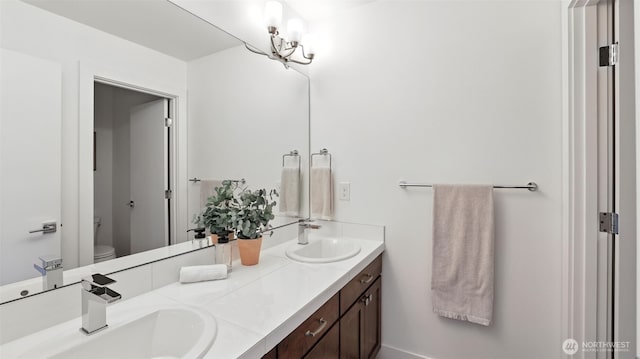 9608 NE 182nd Ct Unit D, Bothell, WA 98011 - full bathroom featuring double vanity and toilet