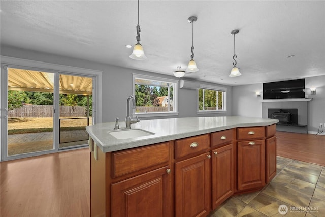 11636 25th Ave SE, Olympia, WA 98513 - kitchen with a wall mounted AC, a kitchen island, open floor plan, and decorative light fixtures