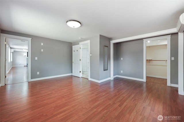 11636 25th Ave SE, Olympia, WA 98513 - spare room featuring baseboards and wood finished floors