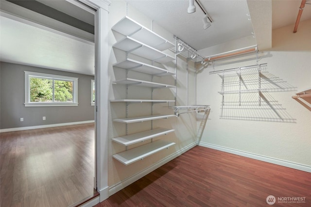 11636 25th Ave SE, Olympia, WA 98513 - walk in closet featuring wood finished floors