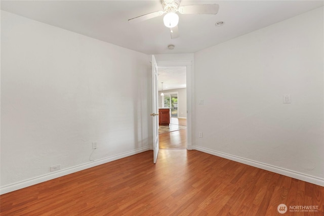 11636 25th Ave SE, Olympia, WA 98513 - spare room with light wood-style flooring, a ceiling fan, and a smoke detector