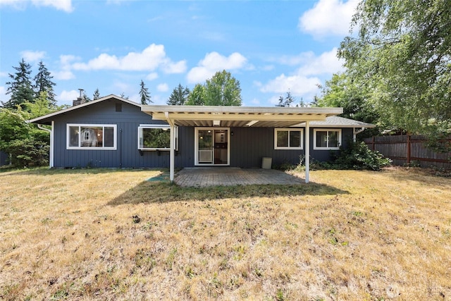 11636 25th Ave SE, Olympia, WA 98513 - back of house featuring a patio area and a chimney
