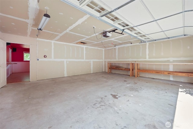 11636 25th Ave SE, Olympia, WA 98513 - garage featuring a garage door opener