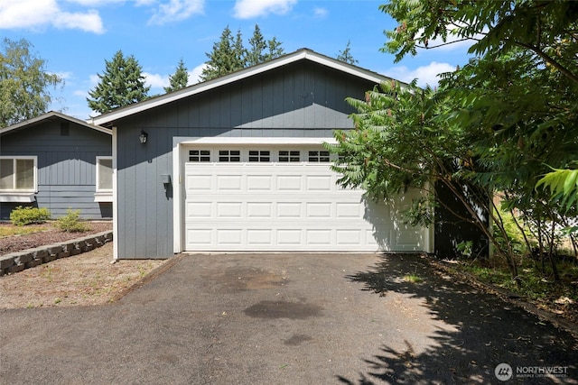 11636 25th Ave SE, Olympia, WA 98513 - view of front of home with an outdoor structure and a garage