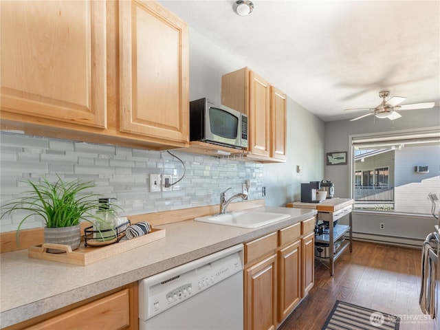 10 S Cove Ave Unit 21, Wenatchee, WA 98801 - kitchen featuring white dishwasher, stainless steel microwave, light brown cabinets, and dark wood-type flooring