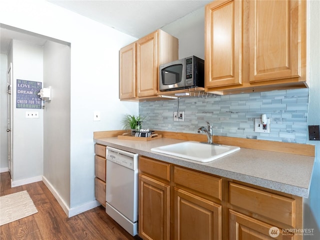 10 S Cove Ave Unit 21, Wenatchee, WA 98801 - kitchen featuring stainless steel microwave, dishwasher, dark wood finished floors, tasteful backsplash, and light brown cabinetry