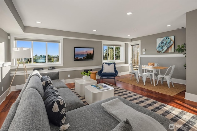 2542 12th Ave W, Seattle, WA 98119 - living area featuring wood finished floors and recessed lighting