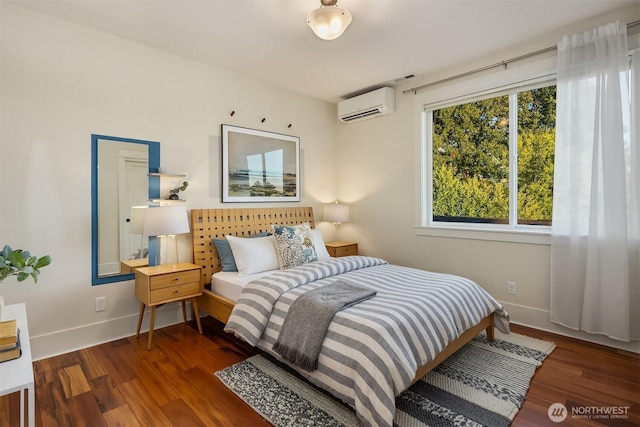 2542 12th Ave W, Seattle, WA 98119 - bedroom with a wall mounted air conditioner and wood finished floors