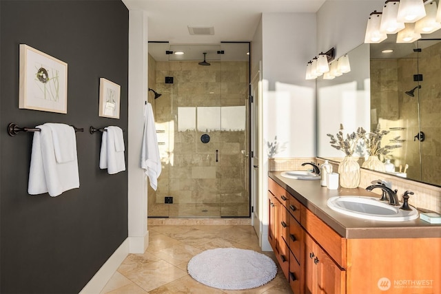 2542 12th Ave W, Seattle, WA 98119 - bathroom featuring a shower stall and double vanity