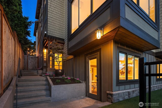 2542 12th Ave W, Seattle, WA 98119 - entrance to property featuring board and batten siding and stone siding