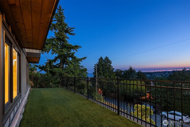 2542 12th Ave W, Seattle, WA 98119 - view of grassy yard with a balcony