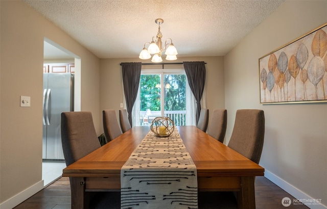1638 Index Ave SE, Renton, WA 98058 - dining room featuring a chandelier, a textured ceiling, and dark wood-style floors