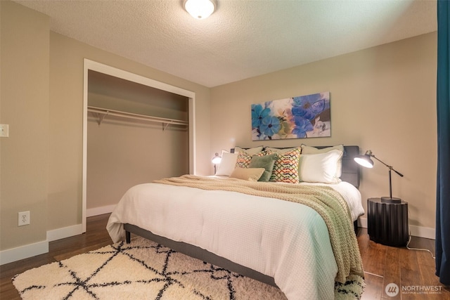 1638 Index Ave SE, Renton, WA 98058 - bedroom with a closet, wood finished floors, and a textured ceiling