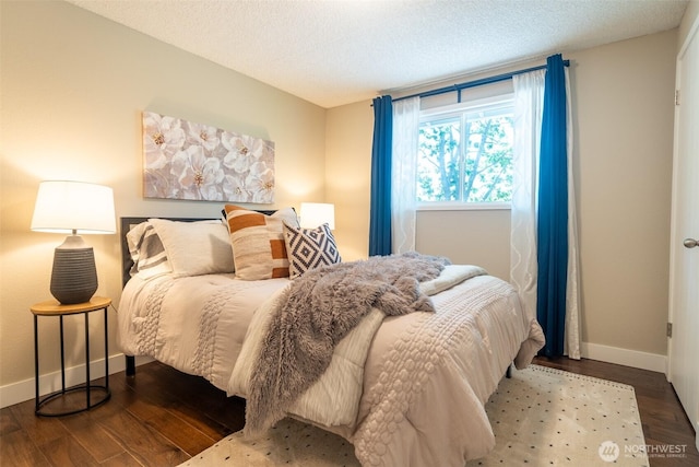 1638 Index Ave SE, Renton, WA 98058 - bedroom with wood finished floors and a textured ceiling