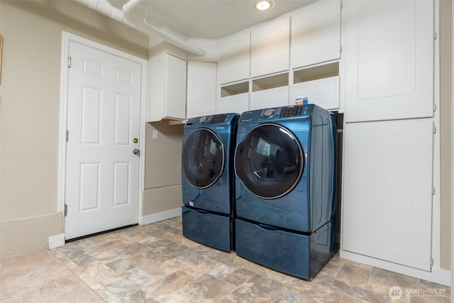 1638 Index Ave SE, Renton, WA 98058 - laundry room with washer and clothes dryer and stone finish flooring