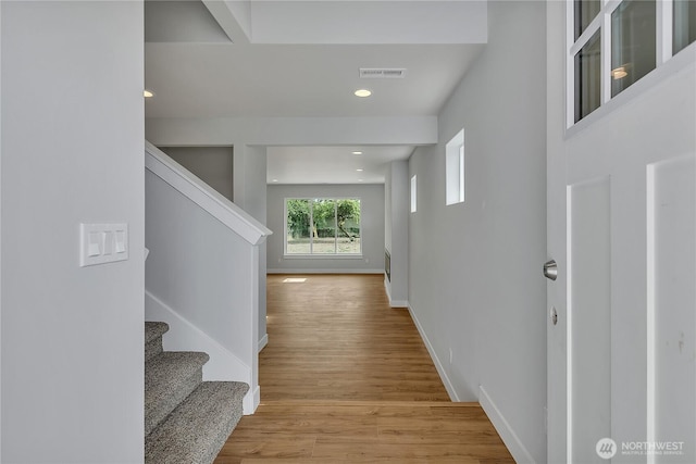 608B Deeded Ln SW, Orting, WA 98360 - hall with stairs, light wood finished floors, and recessed lighting