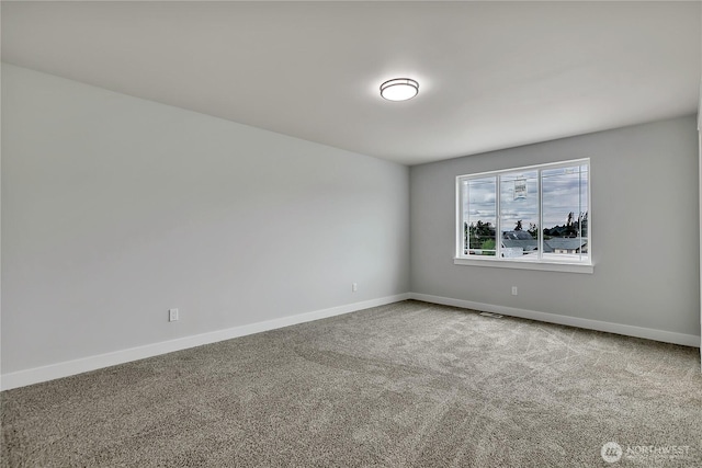 608B Deeded Ln SW, Orting, WA 98360 - carpeted empty room with baseboards