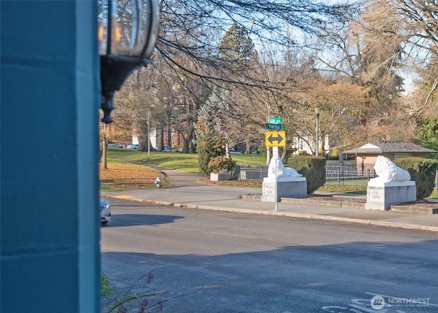 720 6th Ave Unit 206, Tacoma, WA 98405 - view of asphalt street with sidewalks, curbs, and traffic signs