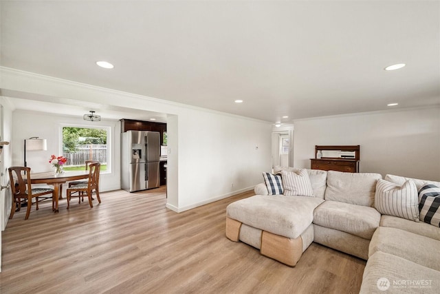 17371 Dunbar Rd, Mount Vernon, WA 98273 - living room featuring crown molding, recessed lighting, and light wood-type flooring