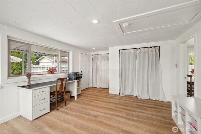 17371 Dunbar Rd, Mount Vernon, WA 98273 - office area featuring attic access, light wood-style flooring, and built in desk