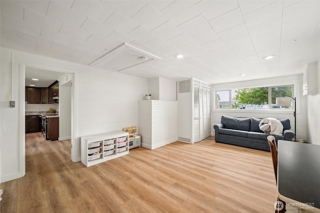 17371 Dunbar Rd, Mount Vernon, WA 98273 - living room featuring light wood-style floors, recessed lighting, and attic access