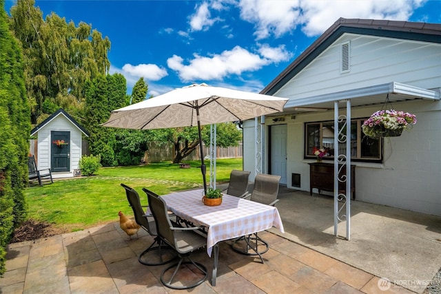 17371 Dunbar Rd, Mount Vernon, WA 98273 - view of patio featuring outdoor dining space and a shed