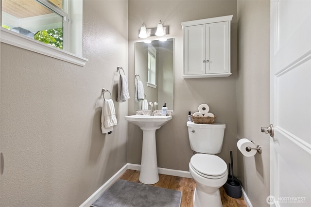 4921 Skylark St NE, Lacey, WA 98516 - bathroom with wood finished floors and toilet