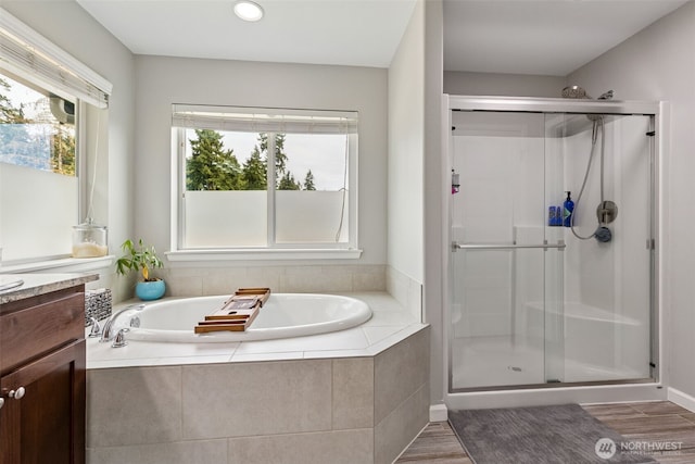 4921 Skylark St NE, Lacey, WA 98516 - full bathroom featuring a shower stall, healthy amount of natural light, a bath, vanity, and recessed lighting