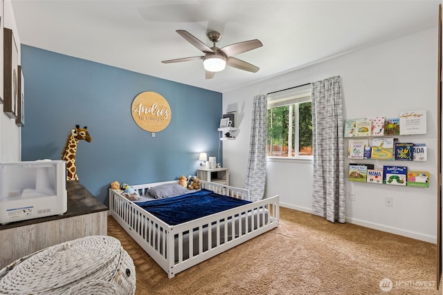 4921 Skylark St NE, Lacey, WA 98516 - carpeted bedroom with baseboards and a ceiling fan