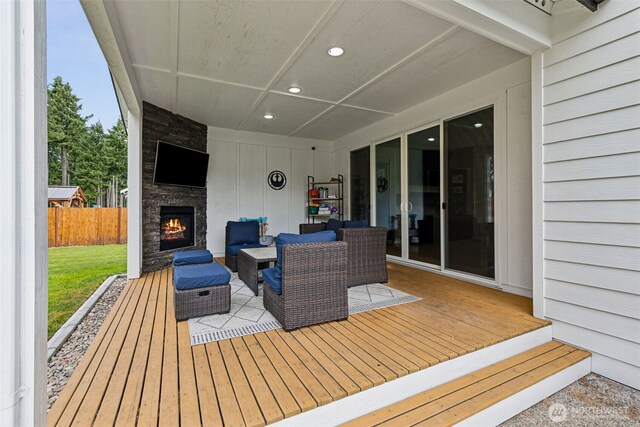 4921 Skylark St NE, Lacey, WA 98516 - wooden deck featuring an outdoor living space with a fireplace