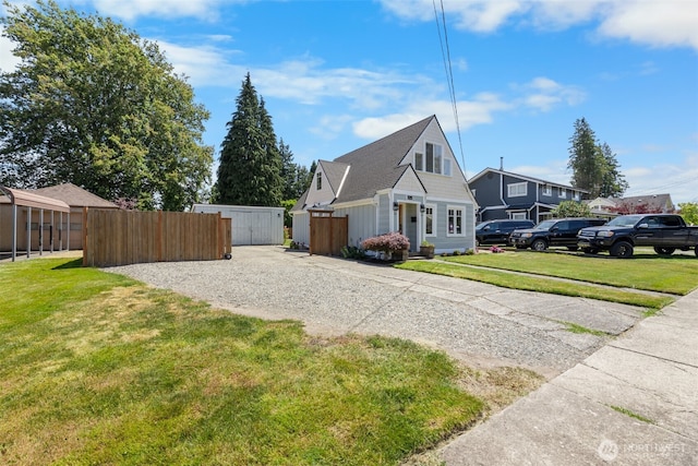 709 7th St SW, Puyallup, WA 98371 - view of property exterior with a gate