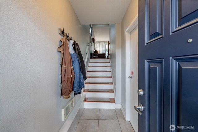 916 N 165th St Unit 7, Shoreline, WA 98133 - foyer entrance featuring stairway and tile patterned flooring