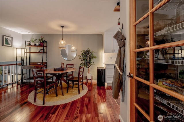 916 N 165th St Unit 7, Shoreline, WA 98133 - dining area featuring dark wood finished floors