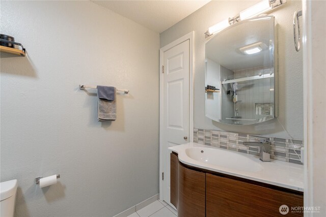 916 N 165th St Unit 7, Shoreline, WA 98133 - bathroom featuring vanity, tile patterned flooring, tasteful backsplash, and a shower