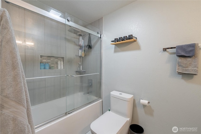 916 N 165th St Unit 7, Shoreline, WA 98133 - full bathroom featuring bath / shower combo with glass door and toilet