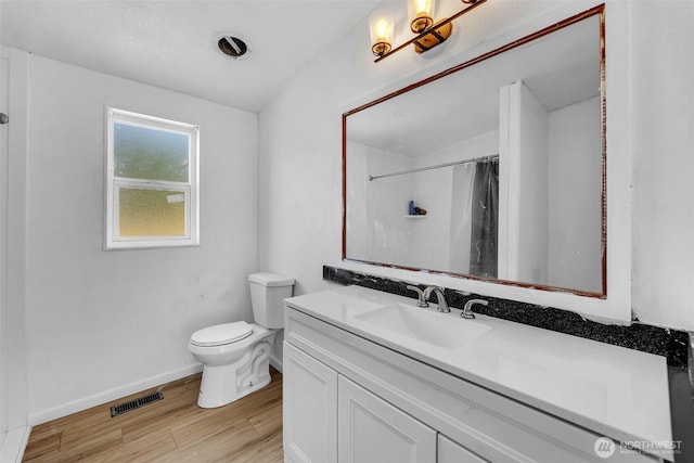 241B Foster Creek Rd, Toledo, WA 98591 - full bath with vanity, wood finished floors, and curtained shower
