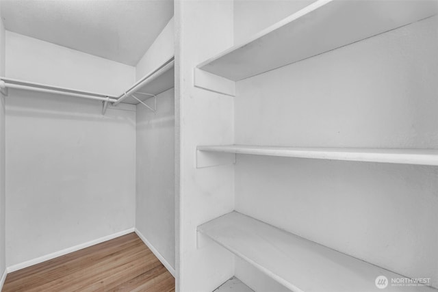 241B Foster Creek Rd, Toledo, WA 98591 - walk in closet with wood finished floors