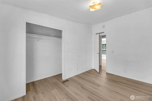 241B Foster Creek Rd, Toledo, WA 98591 - unfurnished bedroom with wood finished floors and a closet