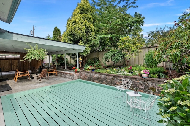 152 E Park Ln, Port Angeles, WA 98362 - wooden terrace featuring a fenced backyard and a patio area