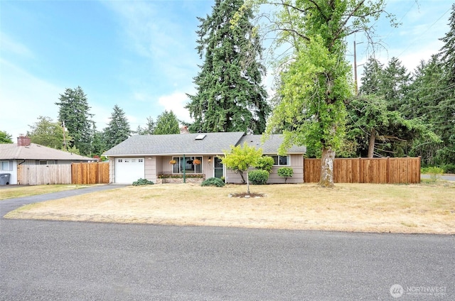 8618 94th St SW, Lakewood, WA 98498 - ranch-style house featuring driveway, a garage, and a chimney