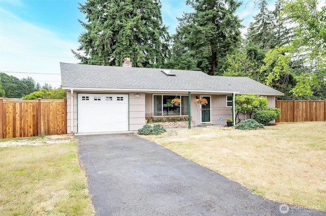 8618 94th St SW, Lakewood, WA 98498 - single story home featuring an attached garage, asphalt driveway, a chimney, and roof with shingles