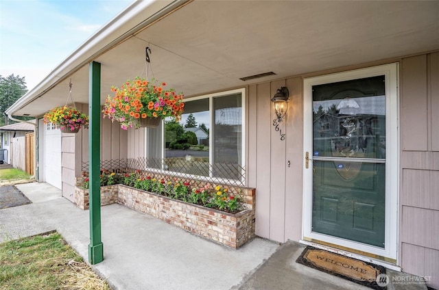 8618 94th St SW, Lakewood, WA 98498 - property entrance with covered porch and board and batten siding