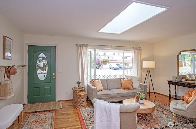 8618 94th St SW, Lakewood, WA 98498 - living room with light wood-type flooring and a skylight